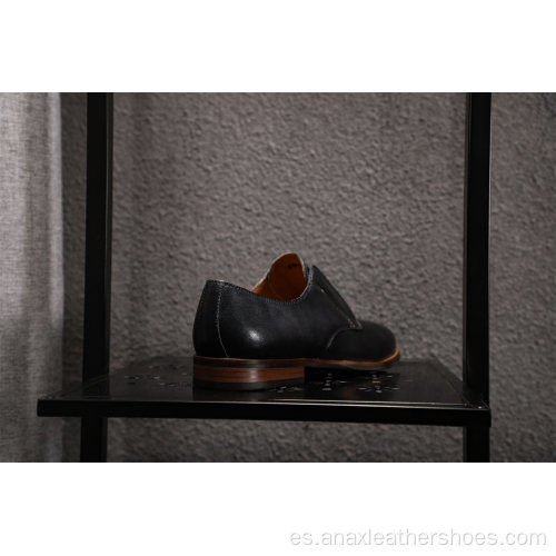 Zapatos casuales transpirables de cuero para hombres de nuevo estilo